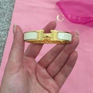 Authentic Hermès gold and cream bangle